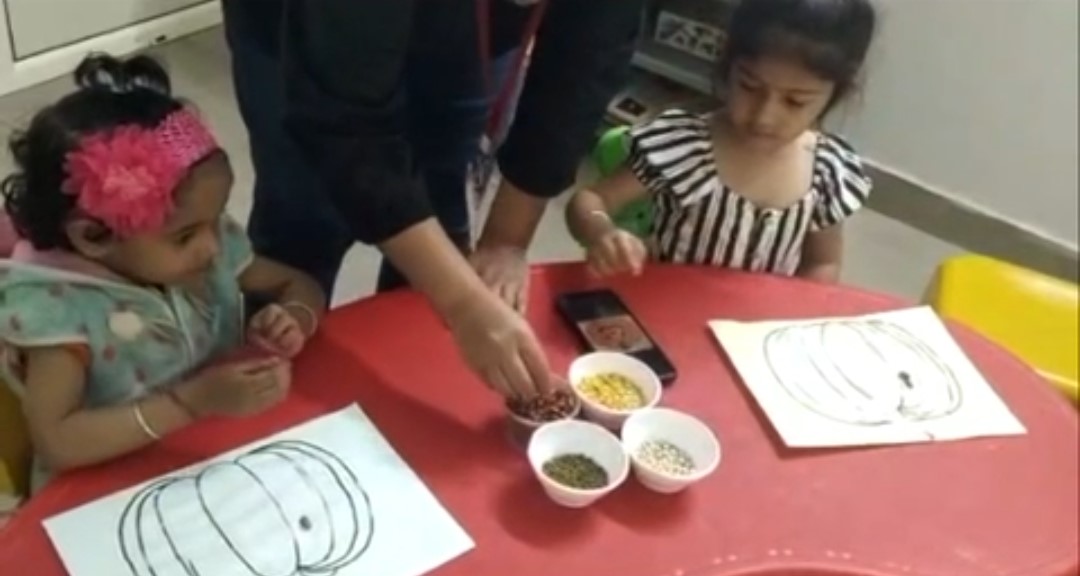 Specialist working with a child during therapy